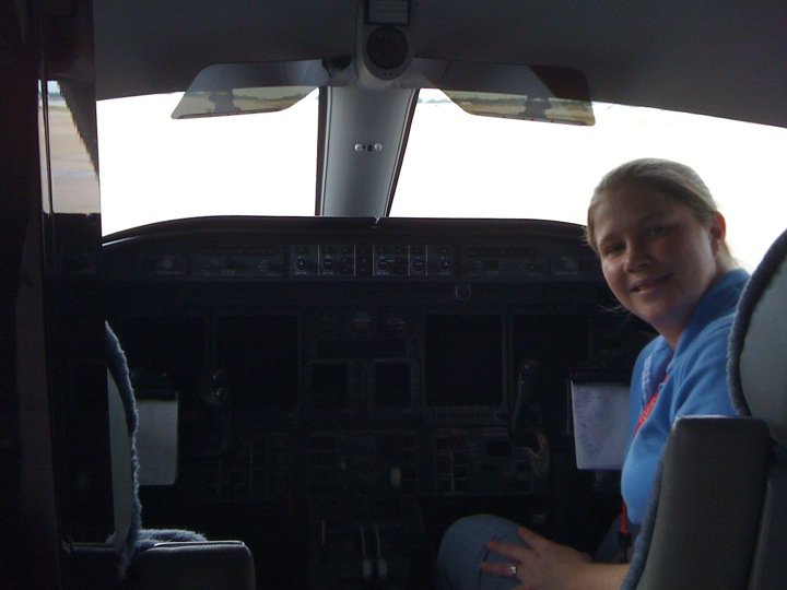 Libby is seen here in a Learjet she flew professionally for 6 years, adding to her flight instructor knowledge and ability